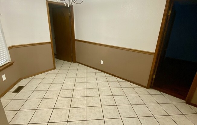 Storm Shelter! 3 bed 2 bath 2 car garage home for rent in Edmond near 15th and Santa Fe, dead end quiet street.