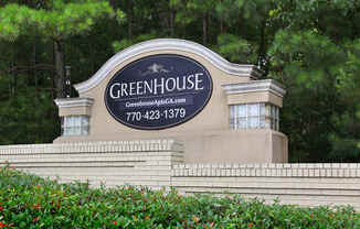 Greenhouse Apartments Sign