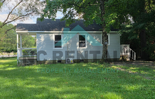 1228 E LINDSAY ST