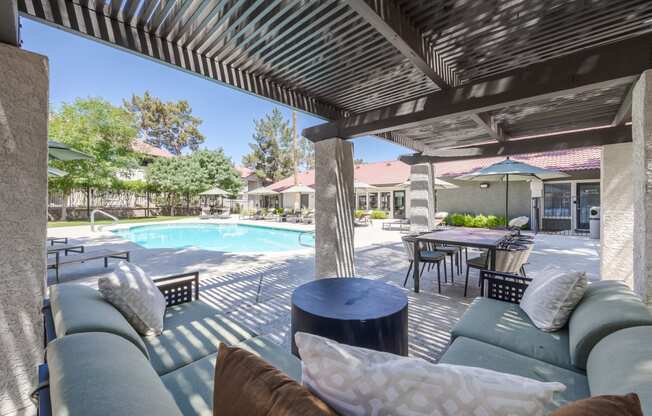 Shaded seating area near pool