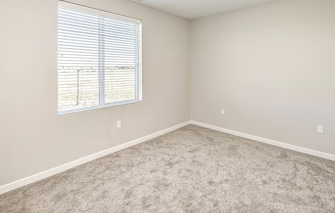 Studio, one two and three bedroom apartments and townhomes featuring open concept floor plans, dens, large windows, stainless steel appliances, quartz countertops, eat-in kitchens, pantries, LVT flooring and much more at The Trails at North Streams in Omaha, NE