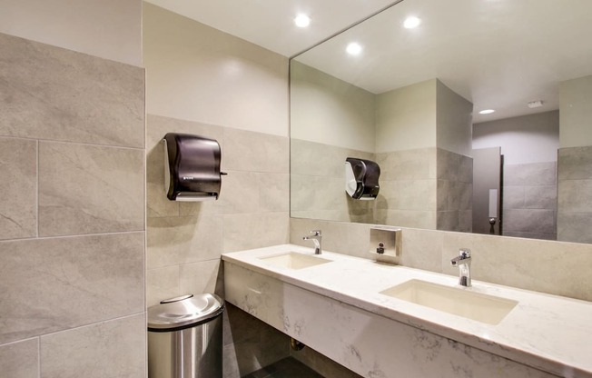 Renovated Bathroom with quartz countertops, recessed lightings