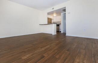 a kitchen with a wood floor