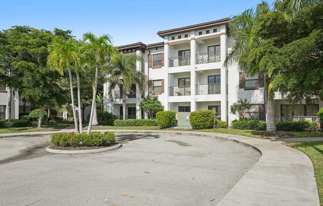 A large apartment complex with a courtyard in the middle.