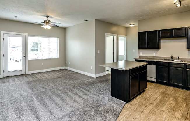 Spacious living room with an open floor plan at Tamarin Ridge in Lincoln, NE