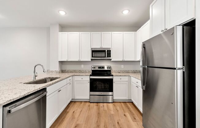 2 beds, 2.5 baths, 1,155 sqft, $1,465, Unit M-8