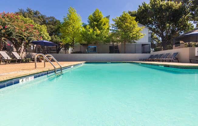 The pool area at The Biltmore Apartments located in the Vickery Midtown neighborhood of Dallas, TX.