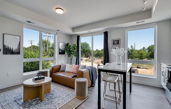 a living room with a couch and a table