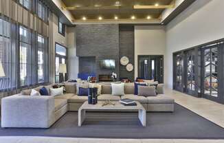 a large living room with a large couch and a coffee table