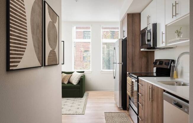 a kitchen and living room in a small apartment