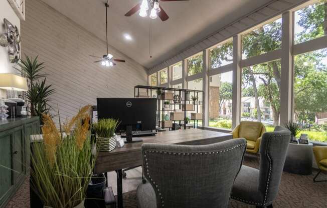 This is a photo of the leasing office at Canyon Creek in Dallas, TX