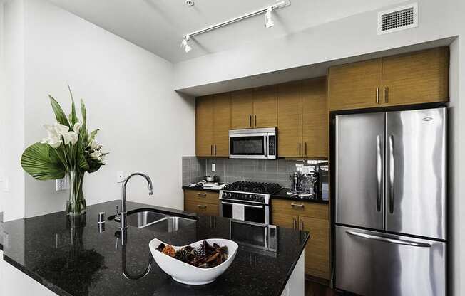 Vacant penthouse apartment home kitchen at Axis, Seattle, WA