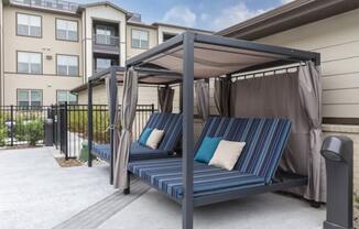 Resort-Style Pool with Tanning Ledges, Cabanas & Hot Tub at The Bridge at McKinney