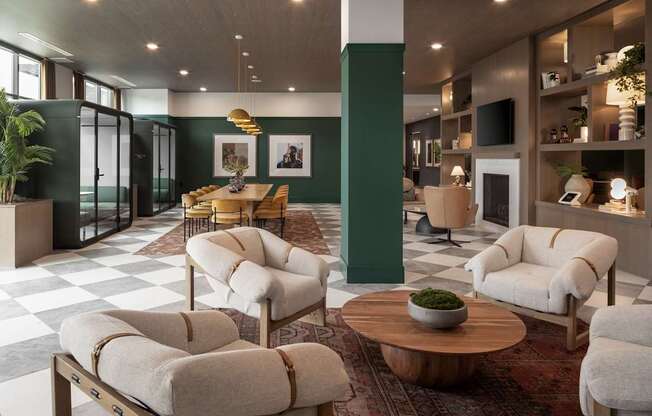 A living room with a checkered floor and a green column.