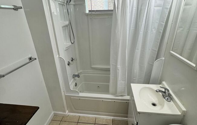 3 bed 2 bath house. Laundry, all electric, hardwoods, central hvac, porch, yard