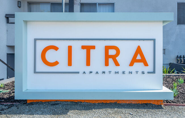 a sign in front of a building that says citra apartments at Citra Apartments LLC, California, 92107