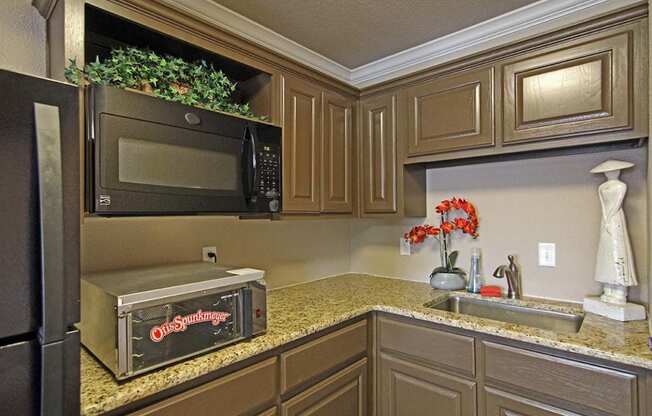 Kitchen Counters and Appliances at Brookside Apartments in Hewitt, TX