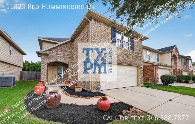 11823 RED HUMMINGBIRD DR