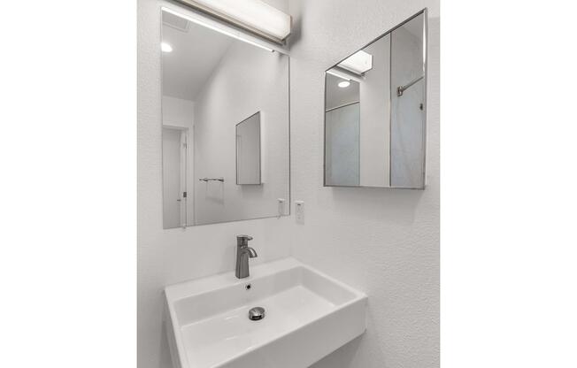 a sink and a mirror