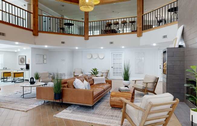 a living room with white walls and a high ceiling