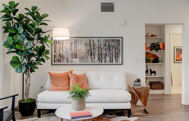 a living room filled with furniture and a fire place