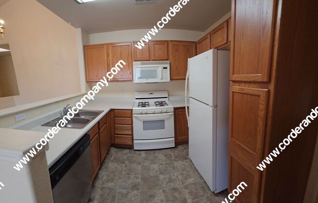 Charming 2 Bedroom, 2 Bathroom, 1 Car Garage and 938 Sq Ft. Condo.