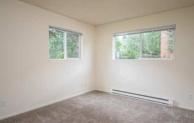 a bedroom at the whispering winds apartments in pearland, tx