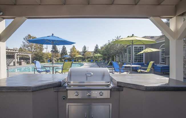grill area by pool deck at North Pointe Apartments, CA 95688