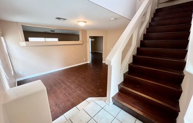 CHARMING HOME AVAILABLE IN SOUTHWEST! HOME HAS LAMINATED HARDWOOD FLOORING, NO CARPETS! KITCHEN HAS BREAKFAST BAR AND ISLAND AND LOTS OF CABINET SPACE! HOME CONTAINS A LOFT UPSTAIRS AND FAMILY ROOM DOWNSTAIRS! BACKYARD PATIO IS COVERED FOR SHADE!