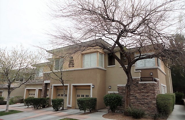 Gorgeous highly upgraded condo in upscale gated Summerlin Community!