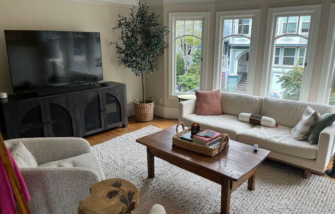 Rare updated bi-level home w/high end finishes, gourmet kitchen, garage and custom 2 car lift!