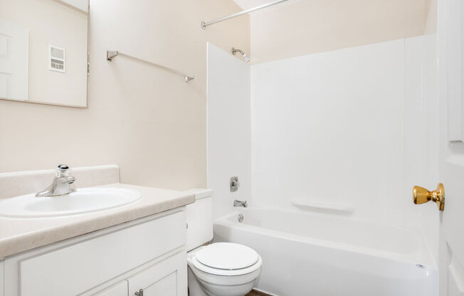 Renovated Bathroom Private Balcony at Wood Creek Apartments in Kenosha, WI