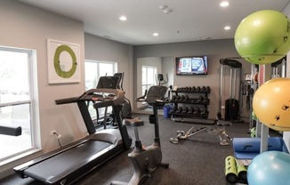 Fully Equipped Fitness center treadmill at Panton Mill Station Apartments,J Street Property Services, LLC, South Elgin, IL, 60177