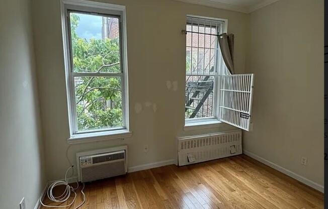 235 E 27 ST