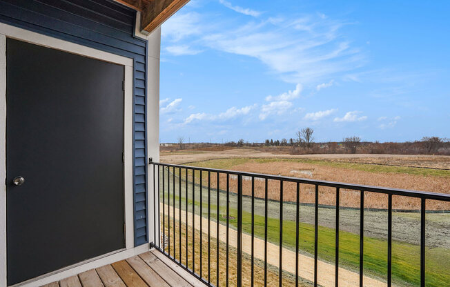 Balcony with Enclosed Storage at Meadowbrooke Apartment Homes in Kentwood, MI 49512