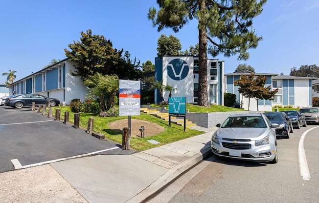 A parking lot with a sign that says