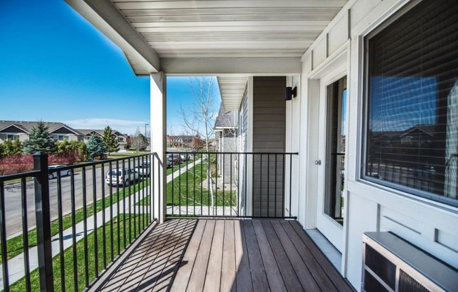 the view of the yard from the balcony of a home at Madison Park, Bozeman, 59718