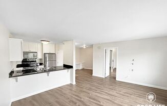 Stunning 1BD/1BA W/ Reserved Parking and Laundry On-Site in College East!