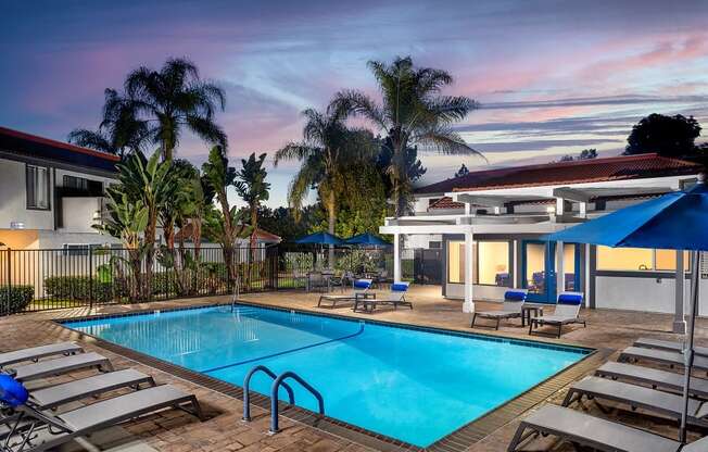 Stone Arbor Pool Deck with Lounge Chairs