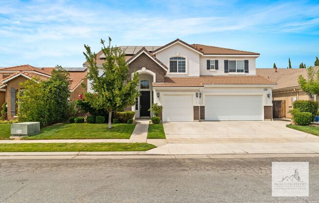 Beautiful 4 Bedroom 3 Bath Home with Solar in Northeast Fresno!