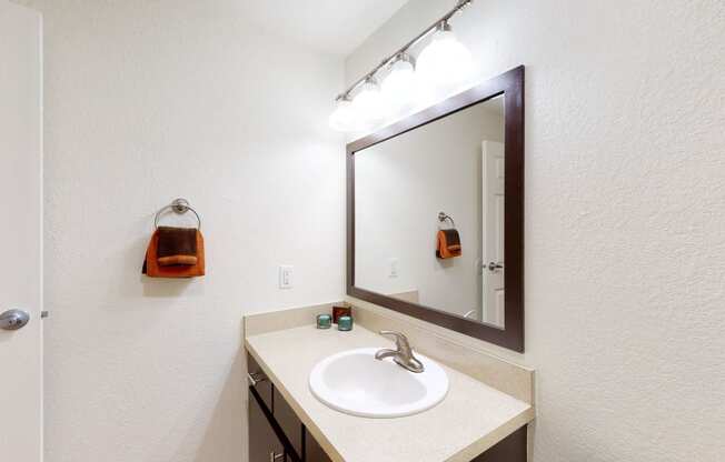 Bathroom with white interior at North Creek Apartments, Everett, WA, 98208