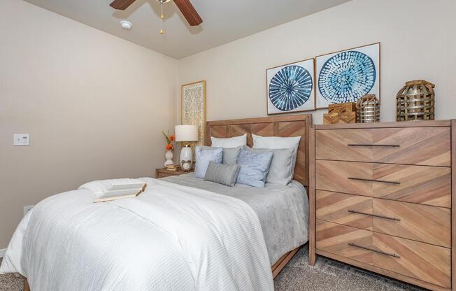 a bedroom with a bed in a room
