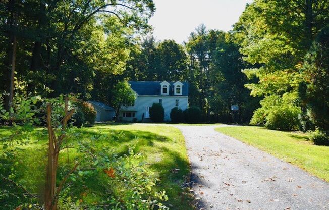 Beautifully situated  4/5 bedroom, 2 bath Single Family home in Tyngsborough, MA