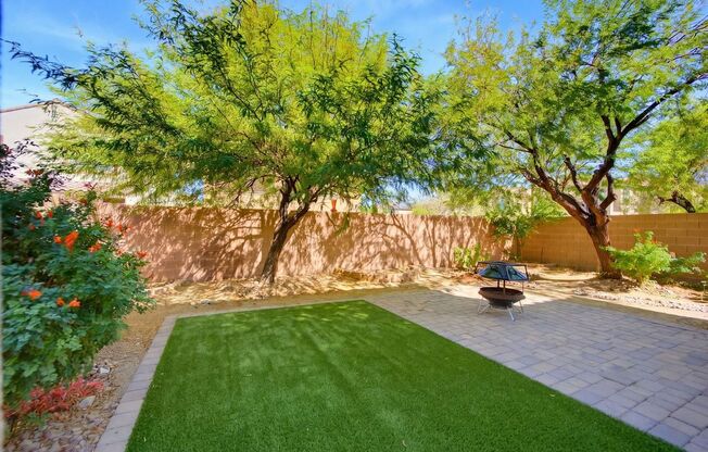 Spacious 2-Story Home w/ Two Balconies, Granite Island Kitchen & Turf Backyard – SW Las Vegas