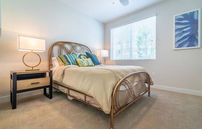 Bedroom with bed at Montecito Apartments at Carlsbad, California