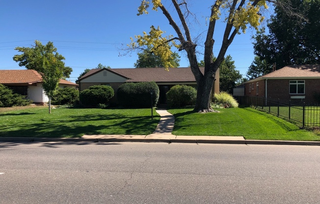 Spacious 4-Bedroom Park Hill Home with Finished Basement & 2-Car Garage