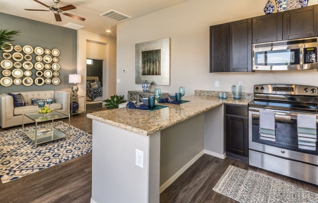 Living Room, Kitchen & Dining Area (2 Bedroom) at Palm Valley Villas in Goodyear, AZ