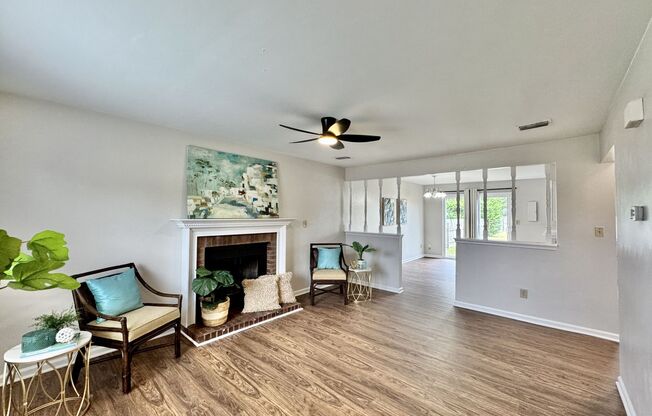 Completely Updated & Ready NOW! New Flooring, Fresh Paint, New Fixtures! HUGE Fenced Backyard!