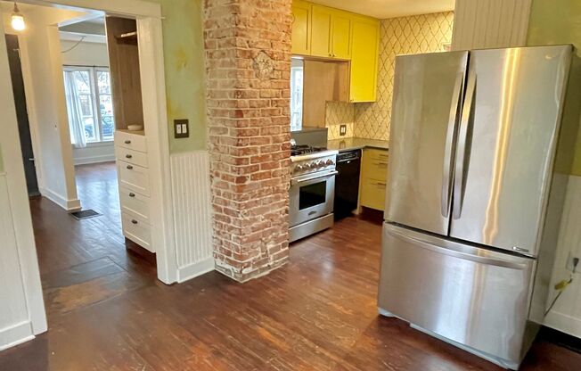 North Tabor Charmer with Sprawling Backyard, Detached Garage, Hardwoods, Lots of Upgrades