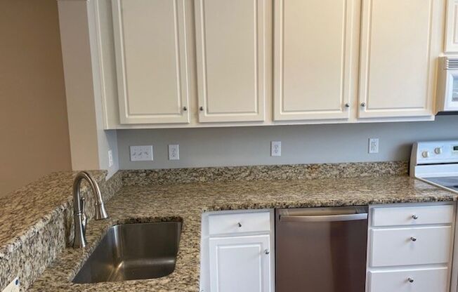 Must See Townhouse! Tons of Living Space! Community Pool & Clubhouse!